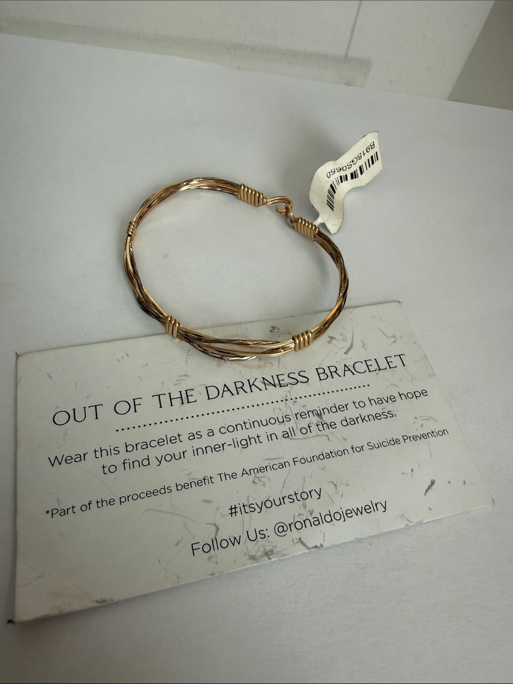 Out of the Darkness Gold Twisted Bangle Bracelet
